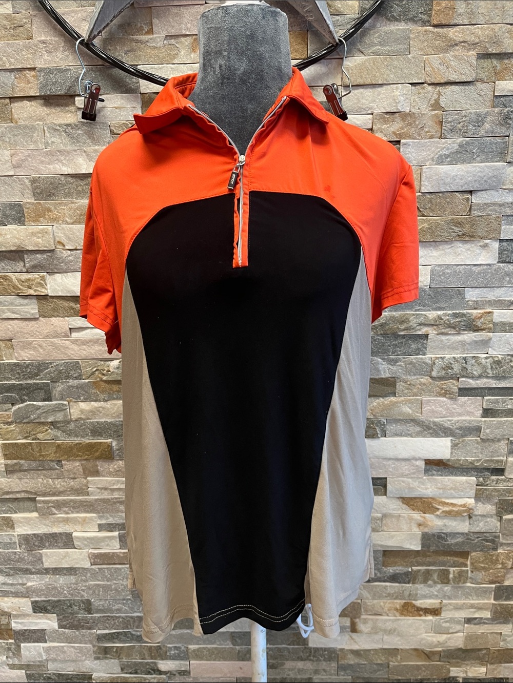 DKNYGOLF is Colorblock Half-Zip Polo in Orange, Black & Tan